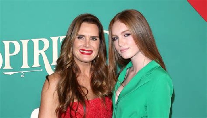 Brooke Shields with her current husband, Chris Henchy, and her two daughters.